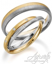 Обручальные кольца из желтого и белого золота с бриллиантами